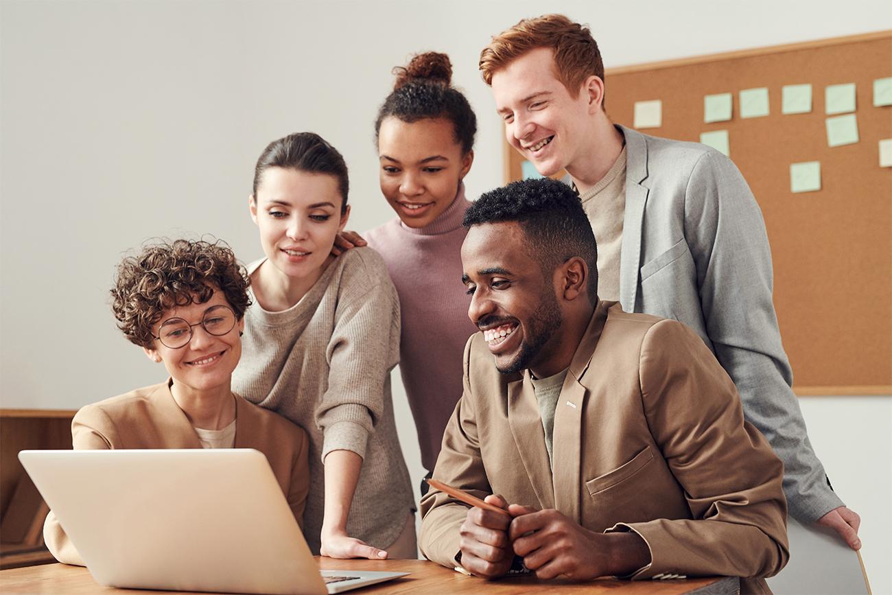 HR team looking a laptop